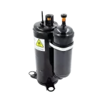 Vista lateral del compresor Midea KSK103D33UEZ3 con unidad de succión y advertencia de seguridad