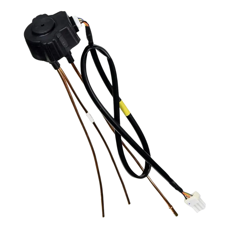 Vista superior de la válvula AJU74892401 para neveras LG, mostrando conexiones de entrada y salida.